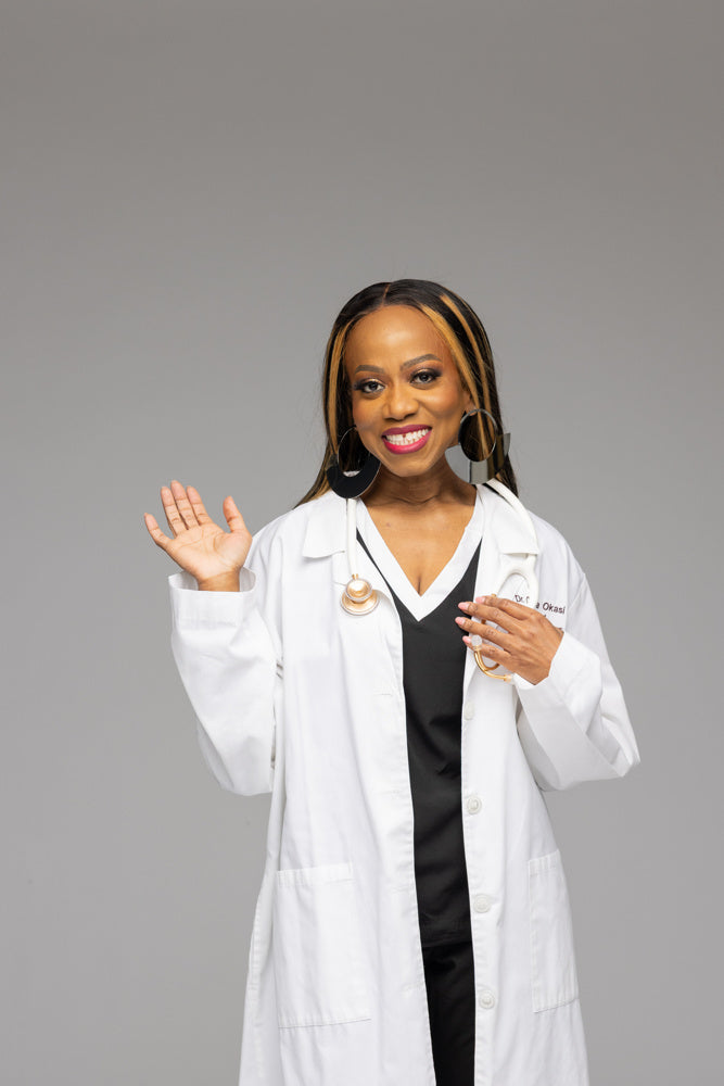 Dr. Chetanna Okasi greeting the camera in white coat